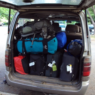 the bottom layer: our luggage. The rest: the other 3 passengers.